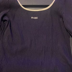 Navy blue, long sleeve bodysuit. Worn once, looks brand new